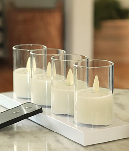 Rechargeable Moving Flame Set of 4 Clear Glass Votives With Charging Base and Remote